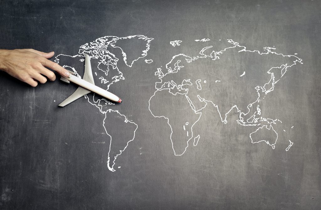 A world map drawn on a blackboard
